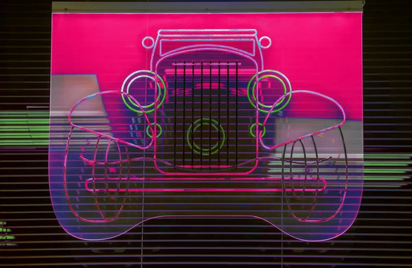 Antique car made of glowing glass tubes — 스톡 사진