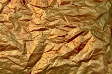Altın buruşuk folyo kağıt doku arka plan.