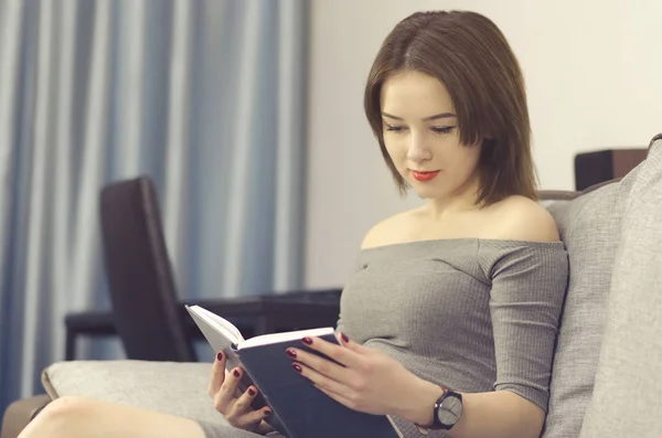 beautiful woman reading the book