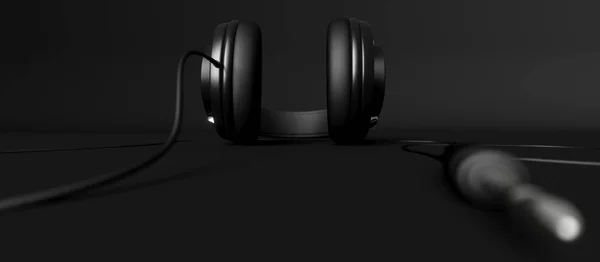 Auriculares sobre fondo negro primer plano — Foto de Stock