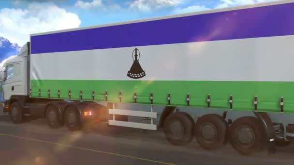 Lesotho Vlag Afgebeeld Zijkant Van Een Grote Vrachtwagen Rijden Een — Stockvideo