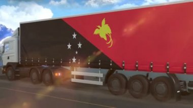 Papua Yeni Gine bayrağı otoyolda giden büyük bir kamyonun yanında görülüyor.