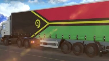 Vanuatu bayrağı otoyolda giden büyük bir kamyonun yanında görülüyor.