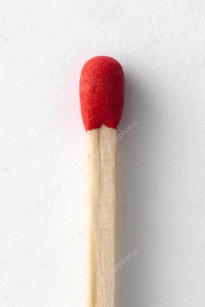 single matchstick with red head