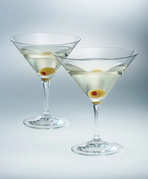 Two glasses martini with olive. cocktail isolated — Stock Photo, Image