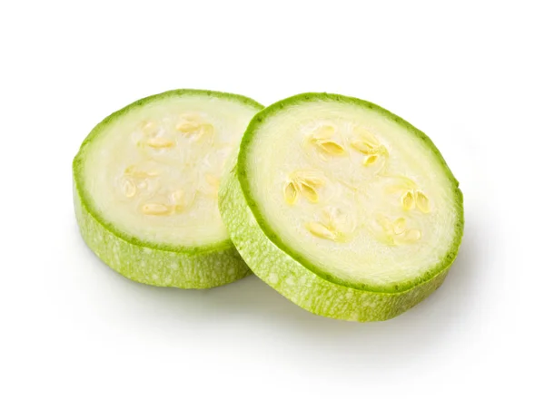 Zucchine affettate isolate su bianco. Courgette — Foto Stock