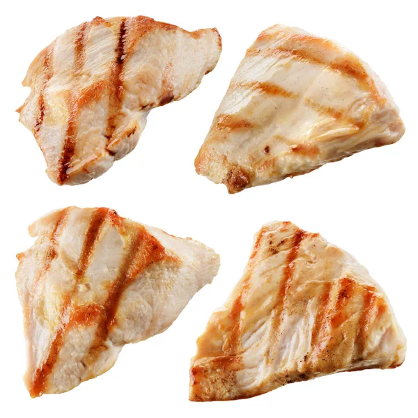 Pedaços de carne de frango grelhados isolados em branco. Recolha — Fotografia de Stock