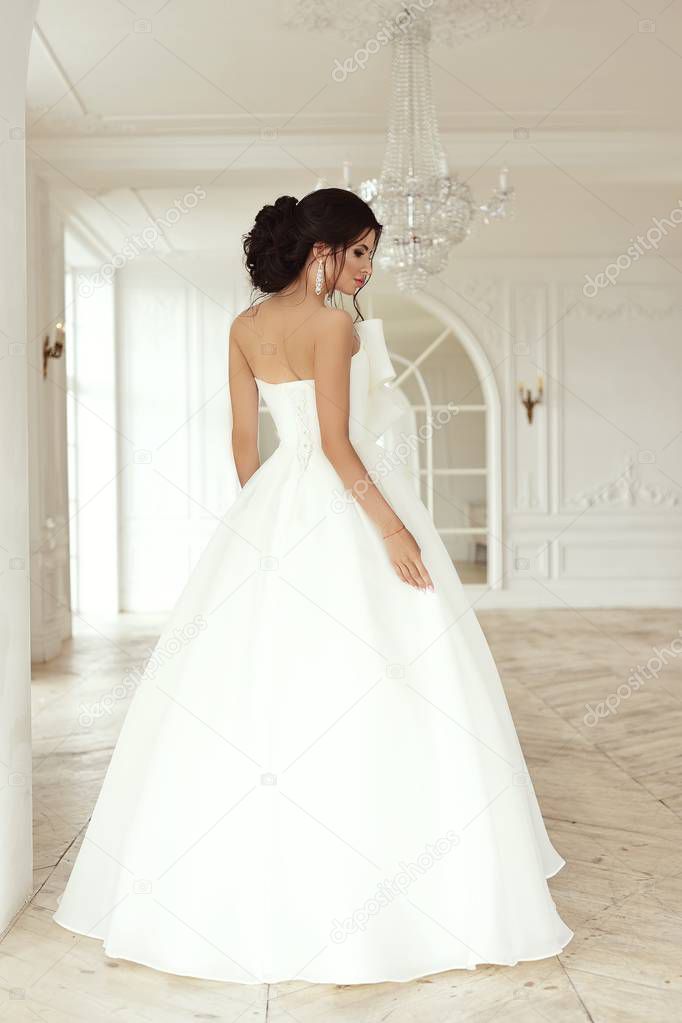 beautiful young woman bride in wedding dress