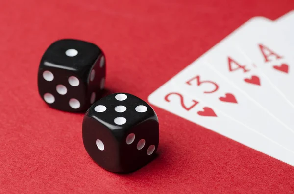 Two Black Cubes Playing Cards Red Background Close — Stock Photo, Image