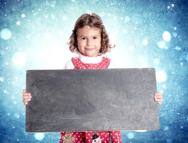 Kleines Mädchen im Weihnachtskleid — Stockfoto