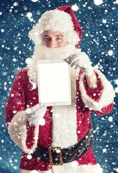 Santa with tablet — Stock Photo, Image