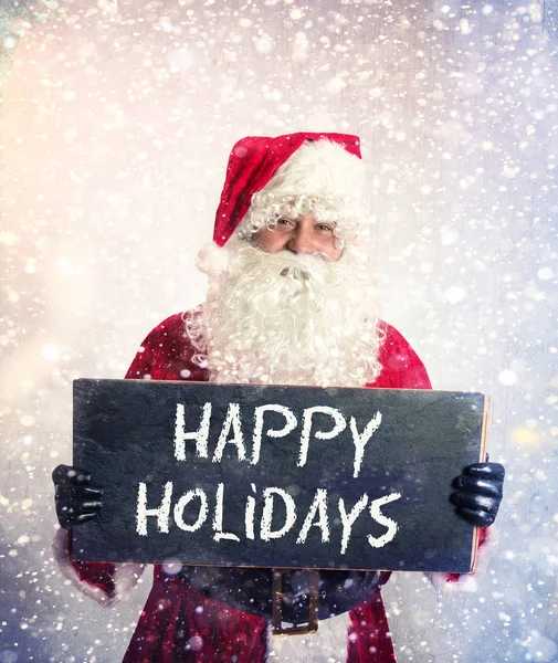 Santa Claus with chalkboard — Stock Photo, Image