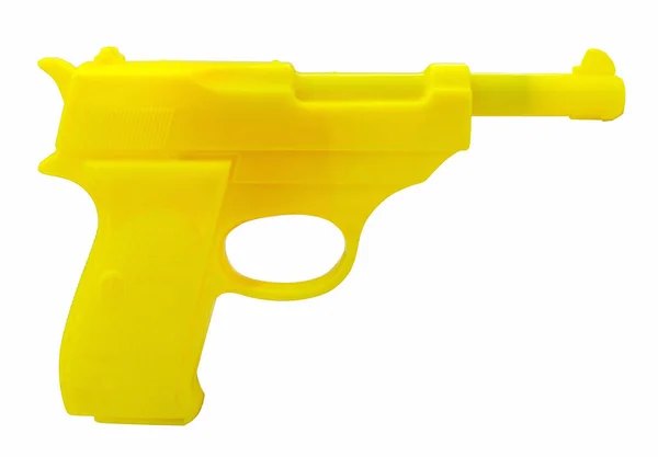 Pistola de brinquedo de plástico amarelo — Fotografia de Stock