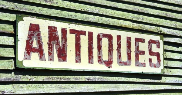 Weathered ANTIQUES Sign