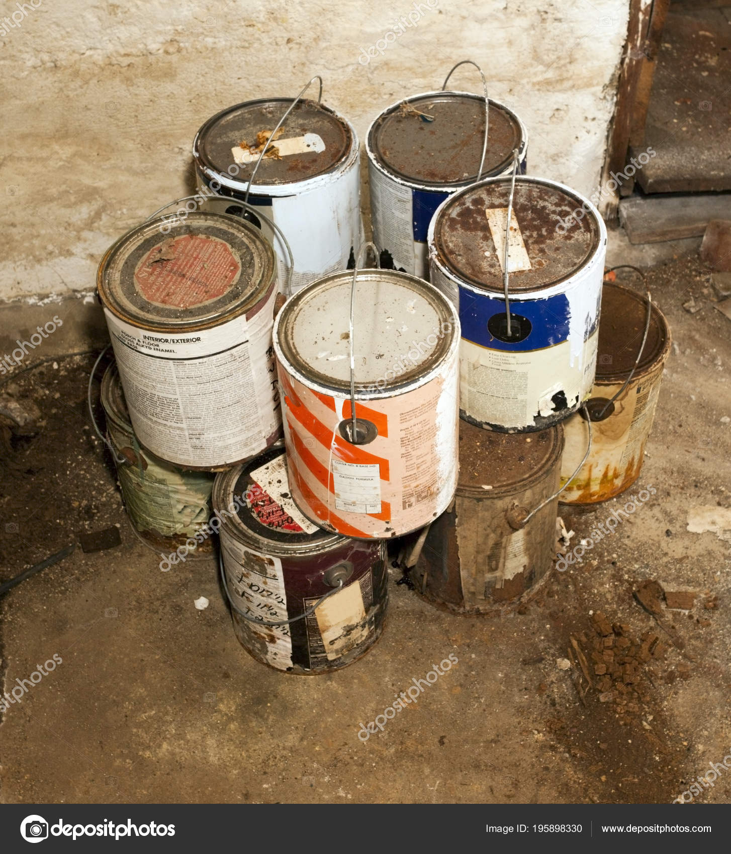 Empty Stacked Paint Cans Dirty Basement Floor Stock Photo by ©ErrantPixels  195898330