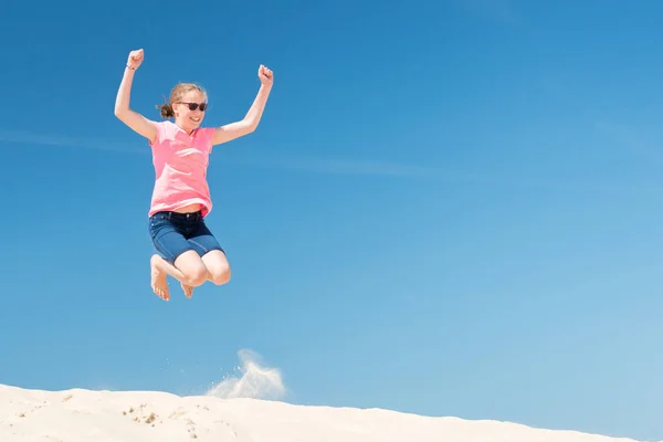 Jumping young girl — Stock Photo, Image