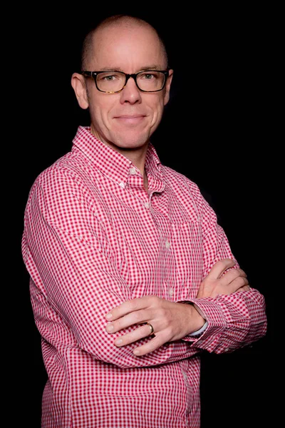 Smiling man with black eyeglasses — Stock Photo, Image