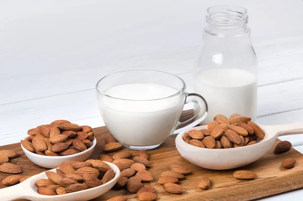 Almond Milk Cup Bottle Almond Nuts Wooden Background — Stock Photo, Image