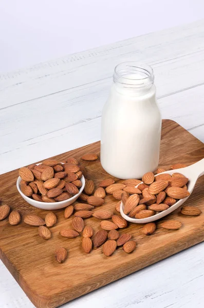 Almond Milk Bottle Almond Nuts Wooden Background — Stock Photo, Image