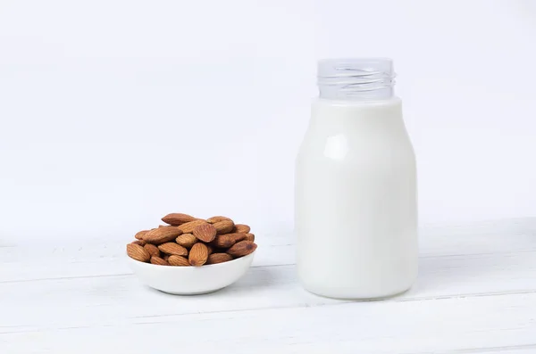 Almond Milk Bottle Almond Nuts White Background — Stock Photo, Image