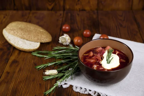 Vegetable soup with beets, rustic style, selective focus — Stock Photo, Image