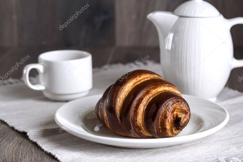 French breakfast with croissant and coffee