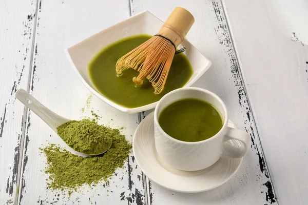 Preparation of tea match: bowl with whisk and tea cup, Green tea