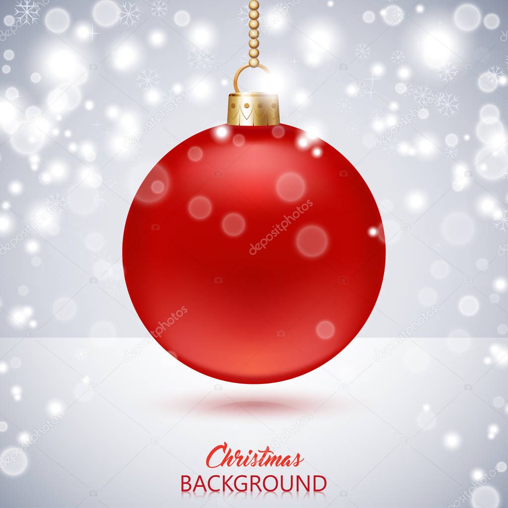 Christmas background with red frosted Christmas ball and snowfal