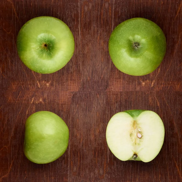 Pattern with apples. Tropical abstract background. Green apple fruits on the rustic background