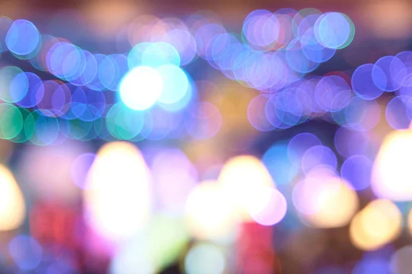Multicolored bright spots. Blurred dark background — Stock Photo, Image