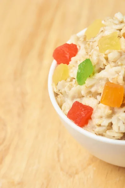 Bright colors. Oatmeal with dried fruits. Useful breakfast — Stock Photo, Image