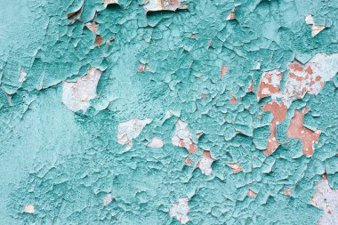 Düzensiz duvar yüzeyi. Eski parlak mavi boya
