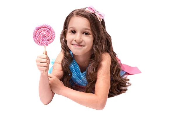 Delicious sweetness. Multicolored lollipops. Little girl — Stock Photo, Image