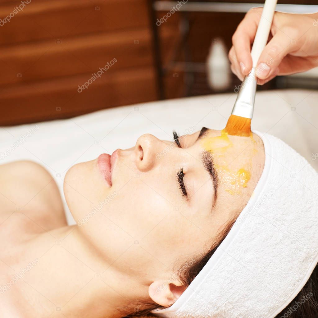 chemic facial and body peel. Cosmetology acne treatment. Young girl at medical spa salon