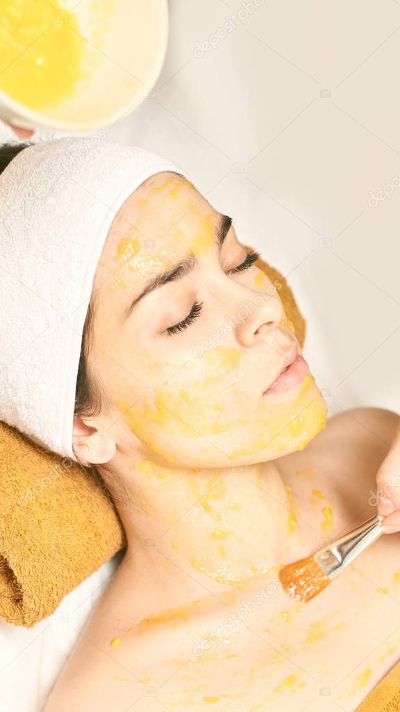 chemic body peel. Cosmetology acne treatment. Young girl at medical spa salon
