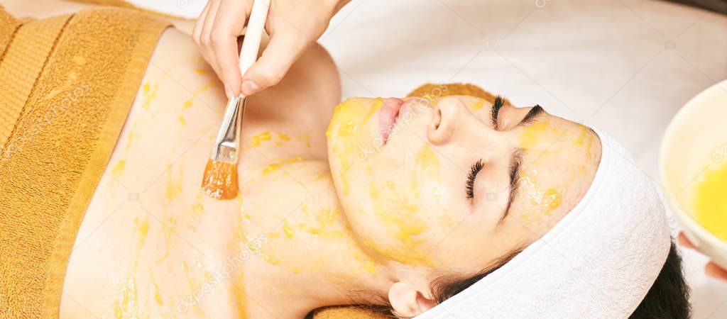 chemic body peel. Cosmetology acne treatment. Young girl at medical spa salon