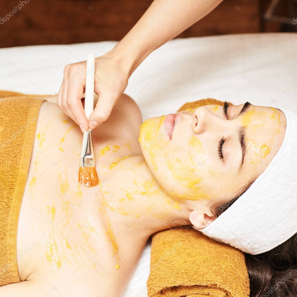 chemic body peel. Cosmetology acne treatment. Young girl at medical spa salon