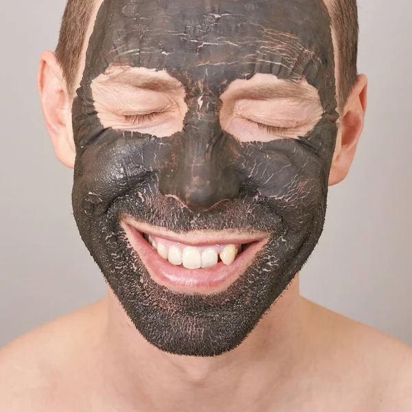 Man portait with face mask. Smiling emotion — Stock Photo, Image