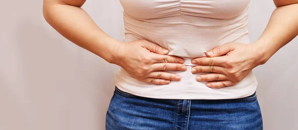 Woman stomach pain. Hold hand near body. Self chiropractic massage — Stock Photo, Image