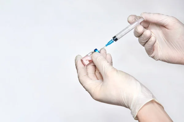 Vacuna de mano en guante. —  Fotos de Stock