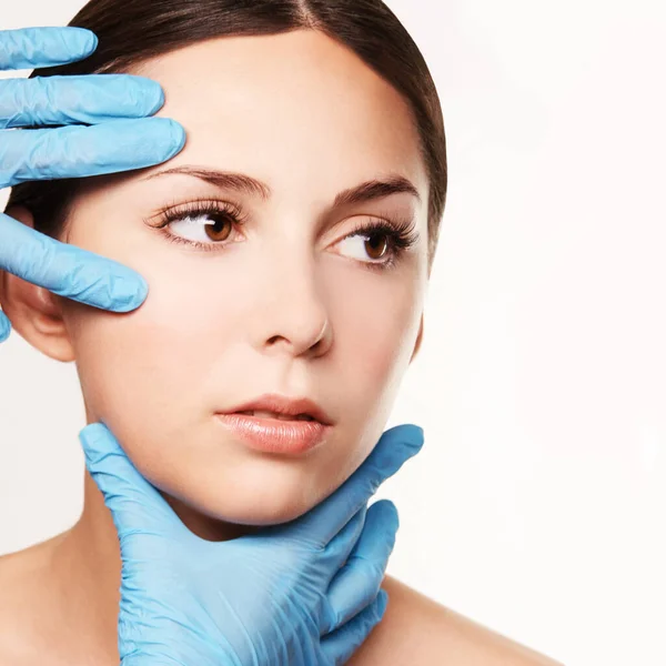 Facelift hydra treats. Esthetic skin care analysis. Doctor hands in gloves. — Stock Photo, Image
