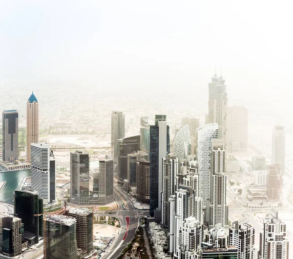 Dubai skyscrapers in desert — Stock Photo, Image