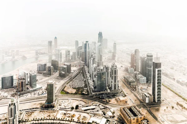 Dubai skyscrapers in desert — Stock Photo, Image