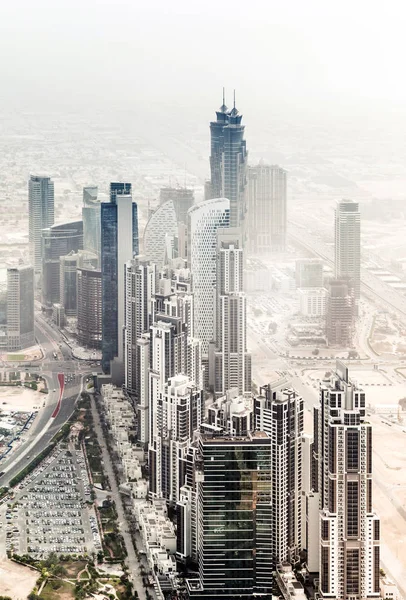 Dubai skyscrapers in desert — Stock Photo, Image