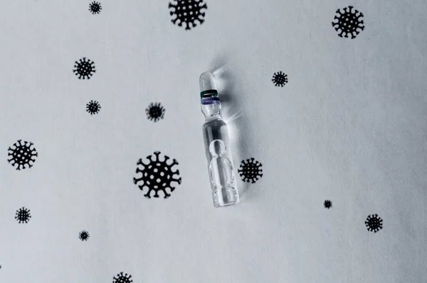 Bu bir ampul ilaç. VACCINE COVID-19 yazıtları var.