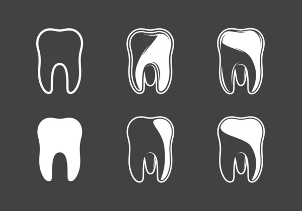 Conjunto de dentes isolados em um fundo preto —  Vetores de Stock