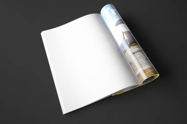 siyah arka plan üzerine boş dergi sayfası