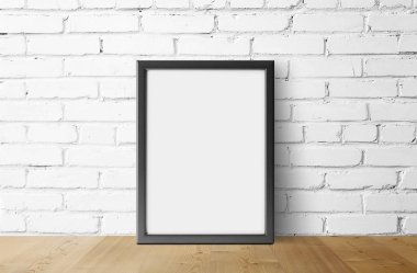 tuğla duvar arka plan üzerinde boş karanlık fotoğraf çerçevesi  