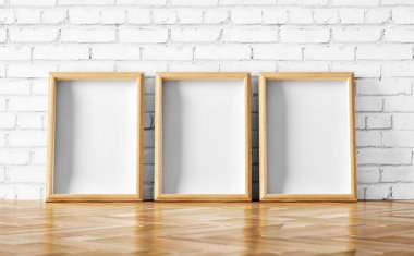 tuğla duvar arka plan üzerinde boş ahşap fotoğraf çerçeveleri  