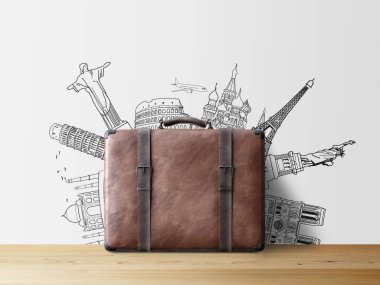 popüler turistik mekanlara duvar, seyahat kavramı kroki ile kahverengi valiz 